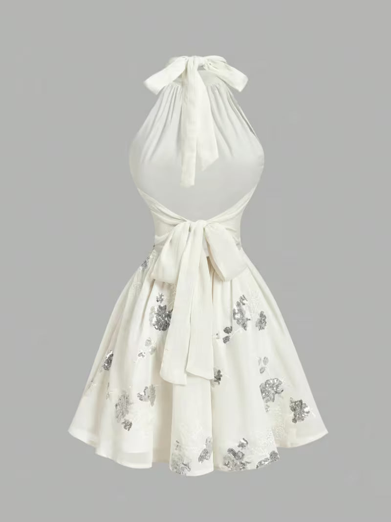 Backless Bowknot Floral Short Dress | The Gentle Floral Pattern Paired with a Large Backless Bowknot And a Flared Skirt Fully Showcases Romantic Elegance And French Charm